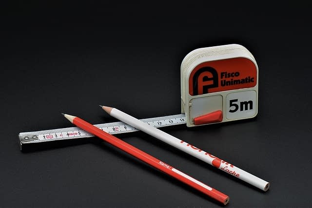 Tape measure with two pencils